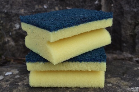 Yellow plastic kitchen sponges